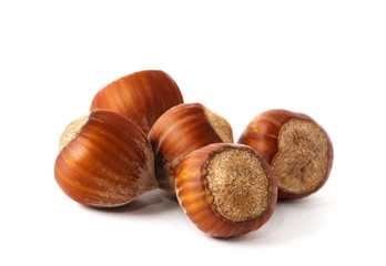 Hazelnuts on white background