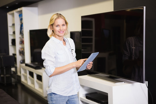 Pretty blonde shopping for new television