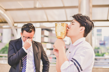 Young businessmen are competing for wins and trophies.