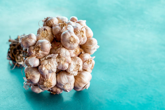 Garlic bulb cloves cluster on background