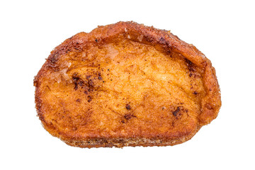 Torrija. It consists of a slice of bread that is soaked in milk or wine and, after being coated in egg, fried in a pan with oil. It is sweetened with sugar and is flavored with cinnamon. Isolated.