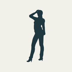 Silhouette of business woman wearing the suit.
