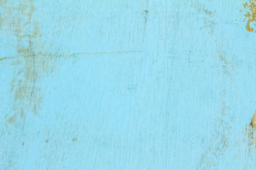 Blue plank background with scratches and cracks