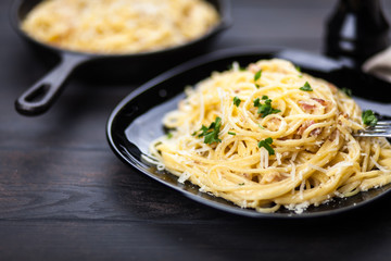 Spaghetti carbonara with egg and pancetta