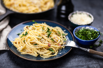Spaghetti carbonara with egg and pancetta