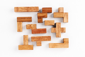 Different shapes wooden blocks on white background