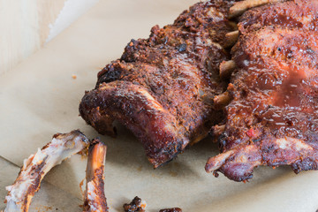 Grilled pork baby ribs with barbecue sauce