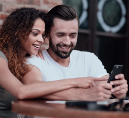 Beautiful couple having coffee on a date,having fun together.