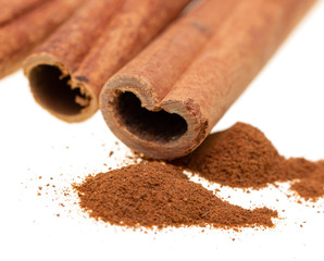 whole cinnamon on white background