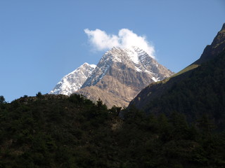 Mountain getting kissed from warm sunlight.