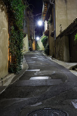 Fototapeta na wymiar Narrow street in the old town in France at night