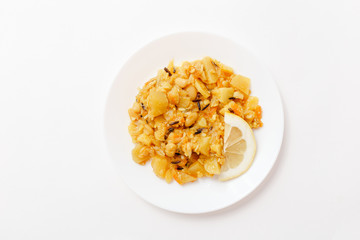 vegetarian roast potato, wild rice, cabbage and beans on white background