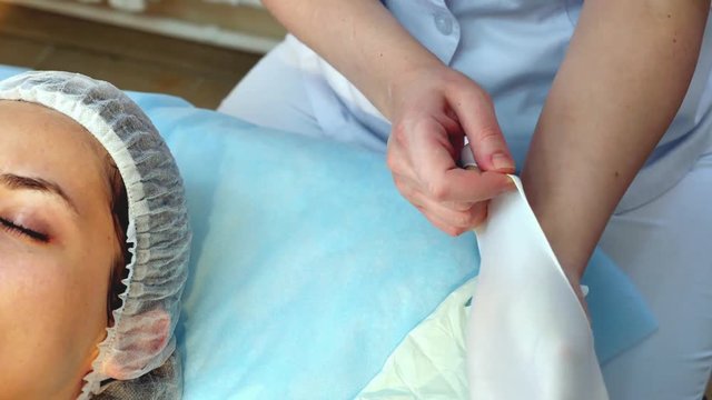 Skin Rejuvenation Treatment massage with facial cream, 4k footage.