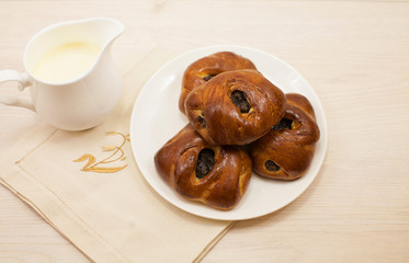 Homemade roll with poppy seeds with milk. Selective focus. Tasty concept. 