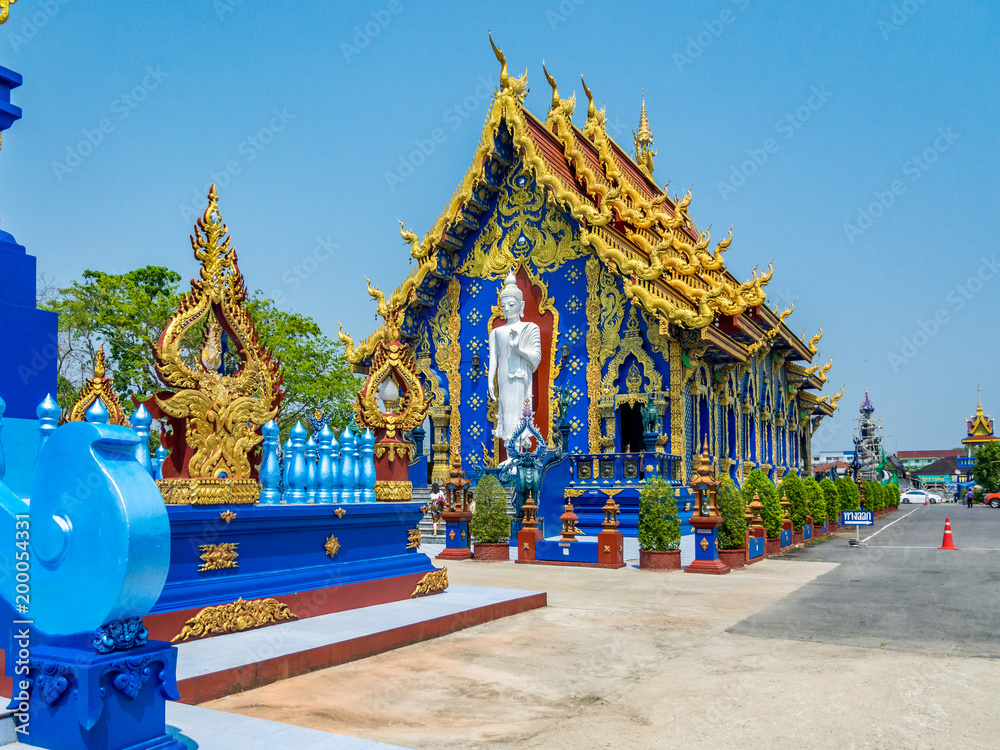 Wall mural beautiful buddhist blue temple (wat rong suea ten) in chiang mai, thailand