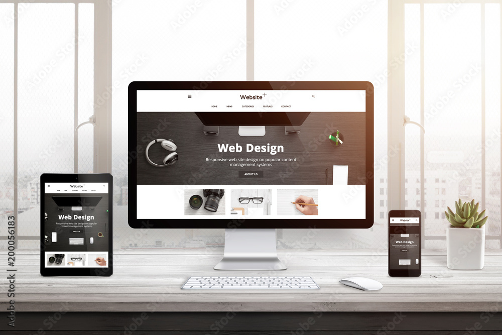 Wall mural web site studio presentation on responsive display devices. modern studio interior. white wooden des