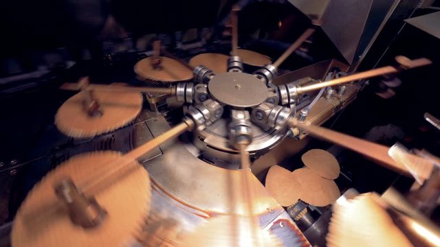 Manufacture of wafers on conveyor. 4K.