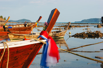 Fototapeta na wymiar national fishing boats on the shore of the Indian Ocean phuket thailand