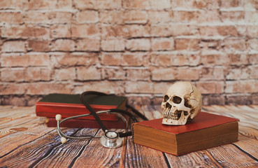 skull with old text book ,concept with medical education .