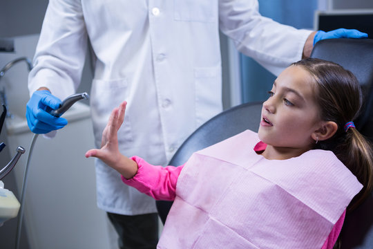 Young patient scared during a dental check-up