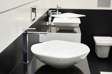 Ceramic sink with faucets