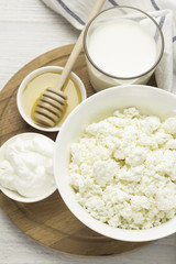 dairy products, cottage cheese, yoghurt, sour cream, milk, honey top view.