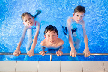 Kids in the swimming pool having fun