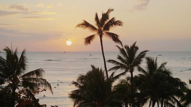 Professional video of colorful sunset in Waikiki beach Hawaii in 4k slow motion 60fps