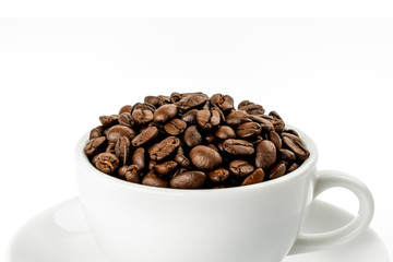 Coffee beans in cup isolated on white background.