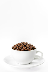 Coffee beans in cup isolated on white background.