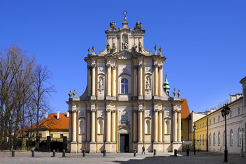 Fototapeta na wymiar Warsaw, Poland - Historic quarter of Warsaw old town - Visitationist Church of St. Joseph at Krakowskie Przedmiescie street