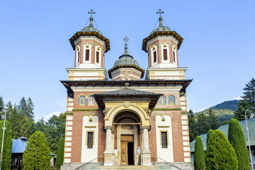Fototapeta na wymiar Daylight front view to Orthodox church of the Sinaia monastery