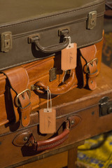 stack of vintage leather suitcases