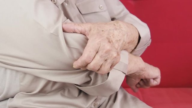 Elderly with a sick hand.