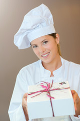 chef holding a gift box