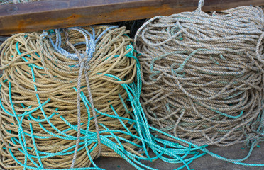 Coils of rope on harbour wall, Ilfracombe, Devon, England