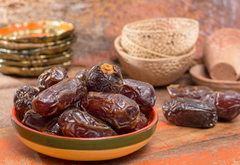 Traditional Middle East dessert, healthy food, big medjool dates fruits.