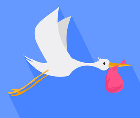 Stork. Stork flying in the sky in the beak of the bag.