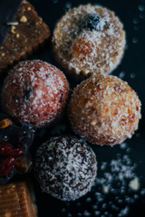 Sweets without sugar with dried fruits, sprinkled with coconut chips