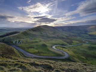 Spring Evening Sunset on Mam Tor with interesting sky looking towards RushUp Ridge with a view over...