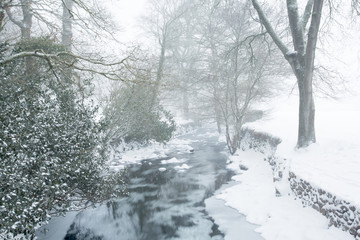 The river okement in winter okehampton devon uk