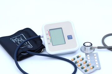 Digital Blood Pressure Monitor on white background Health and Medical concept