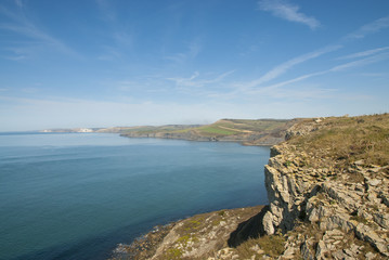 Fototapeta na wymiar Afternoon spring sunshine over Jurassic Coast from St Albans or Adhelms Head, Purbeck, Dorset, UK