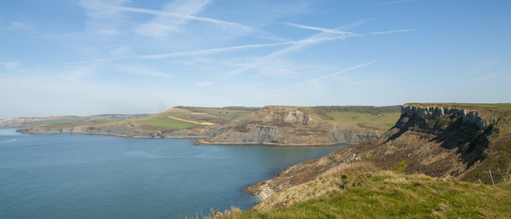 Obraz premium Afternoon spring sunshine over Jurassic Coast from St Albans or Adhelms Head, Purbeck, Dorset, UK