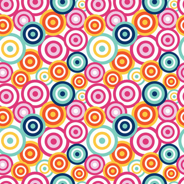 Hand drawn seamless vector pattern with funky concentric circles on a white background. Design concept kids textile print, wallpaper, wrapping paper.