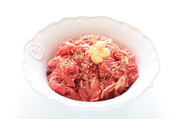 seasoning Japanese marble beef sliced on bowl