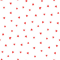 Hand drawn seamless vector pattern with red hearts on a white background. Design concept for Valentines day, kids textile print, wallpaper, wrapping paper.