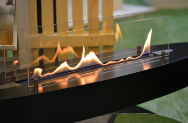 Modern bio fireplot fireplace on ethanol gas. Smart ecological alternative technologies....