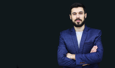 Portrait of a mature man on black background