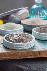Ancient nature minerals, different types of clay used for skincare, spa treatments, face masks, gray, black, green and blue mud, close up